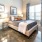 a bedroom with a bed and a lamp