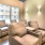 a living room with a couch and a window