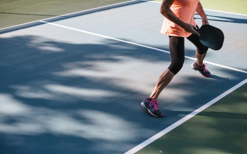 a person playing Pickleball