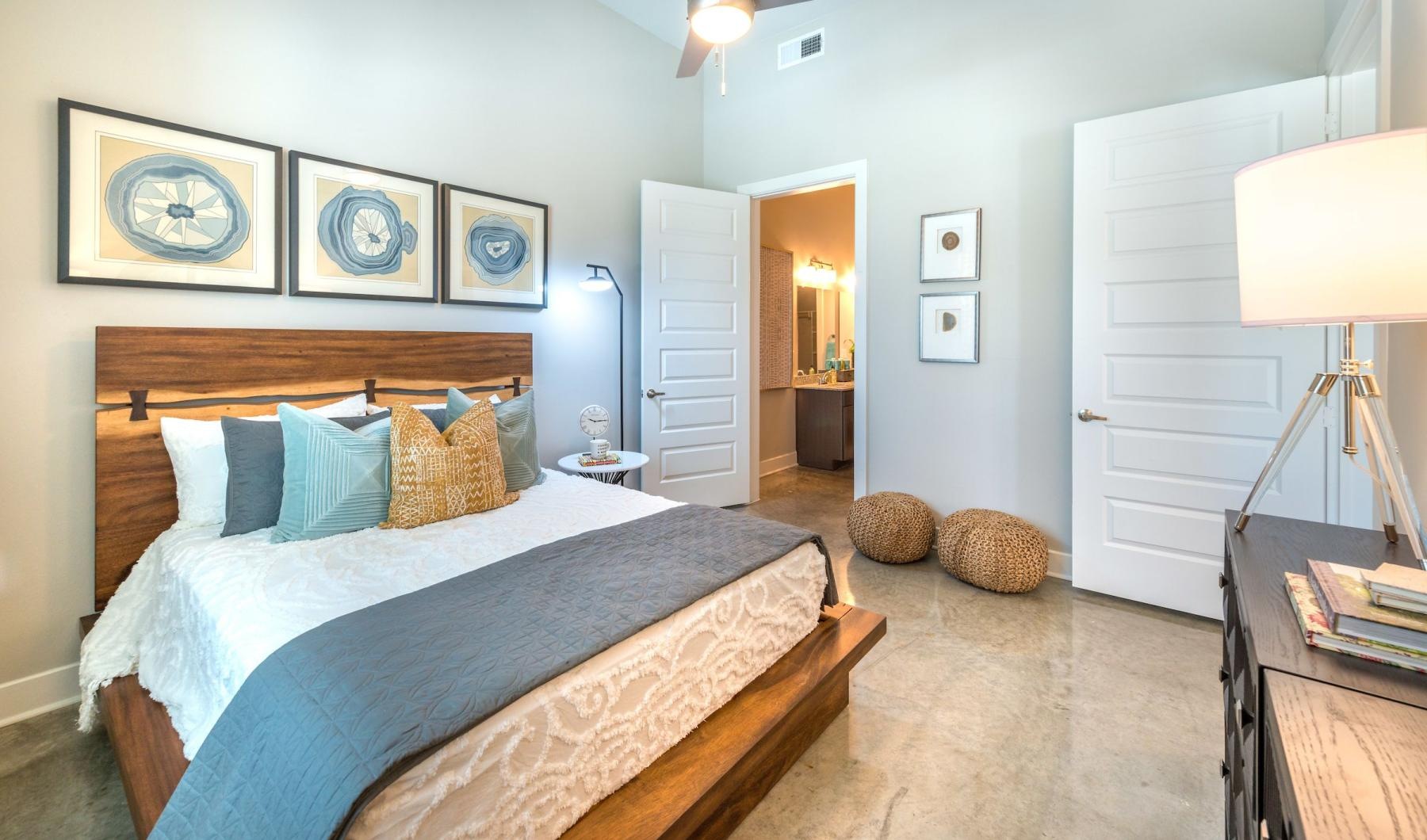 Sleep in style a bedroom with a bed and a lamp