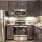 a kitchen with black cabinets