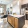 a kitchen with black cabinets
