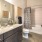 a bathroom with a marble countertop