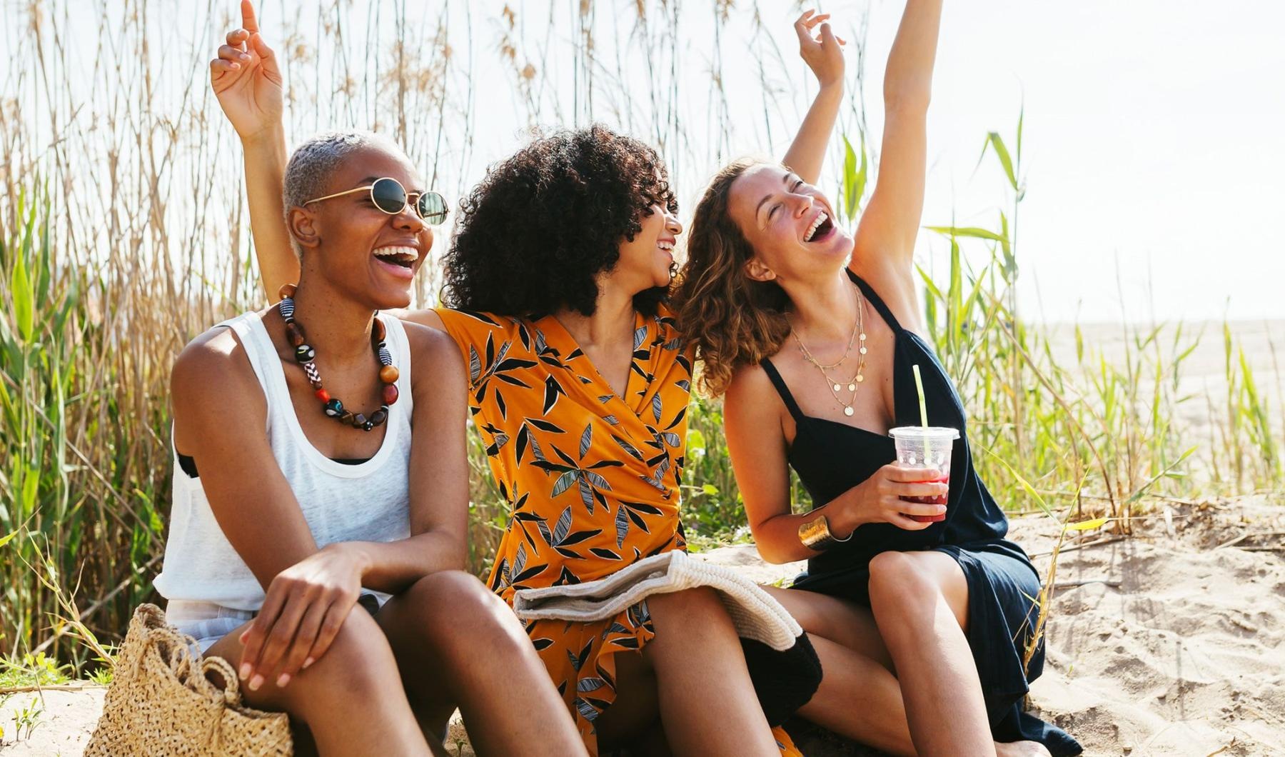 Settle into comfort at Lakeview Apartments a group of people sitting on a beach