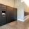 a room with black cabinets