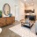 a living room with a tv and couches